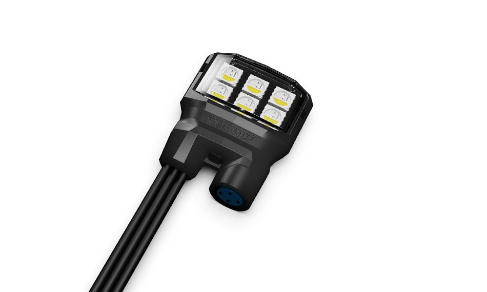 Compact black LED pod with a grid of small LED chips and a black cable on a white background