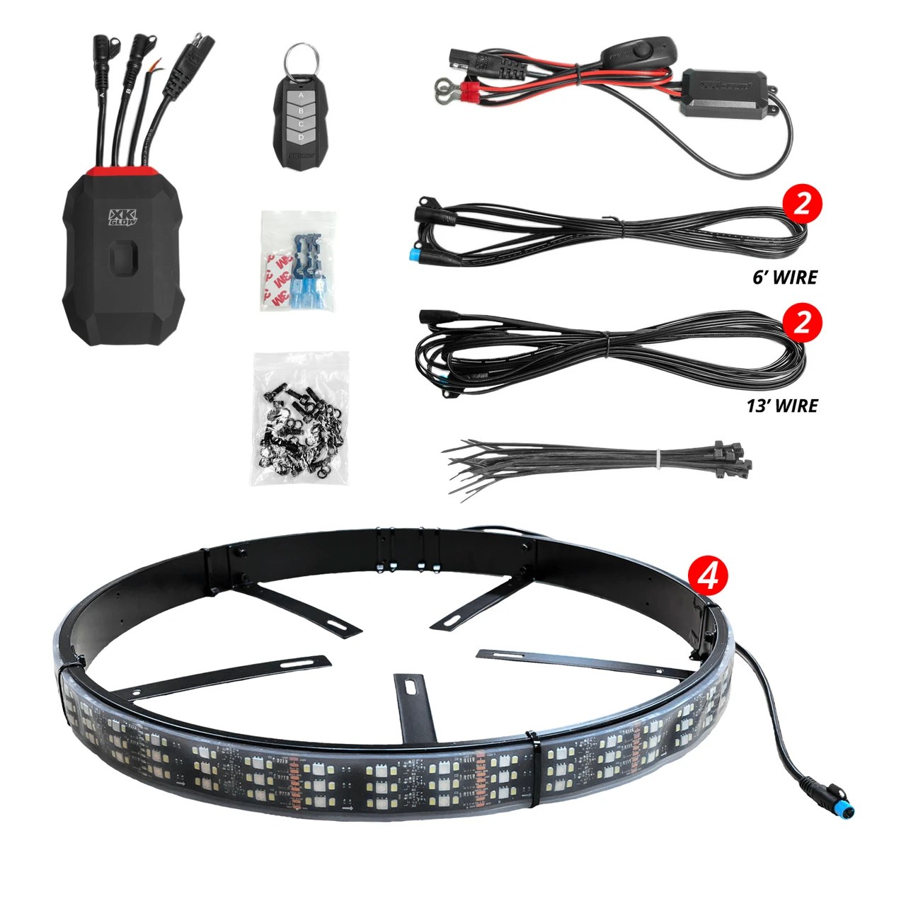 Three-row LED wheel ring laid out with a controller, key fob, wires, hardware bags, and mounting arms